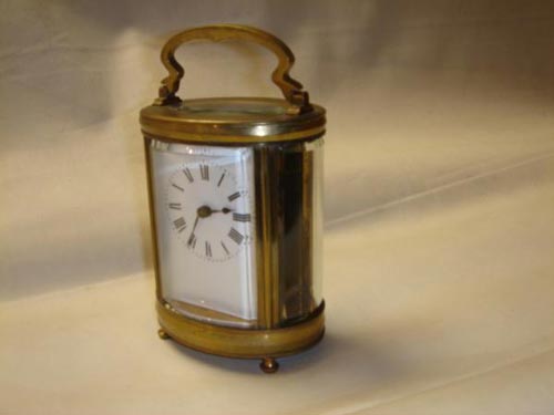 Rare Brass ovale shaped carriage clock