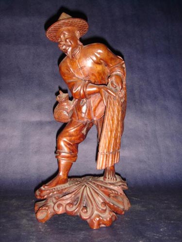 Chinese carved rosewood fisherman 