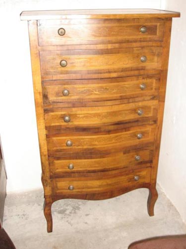 Pair of serpentine fronted chiffoniers